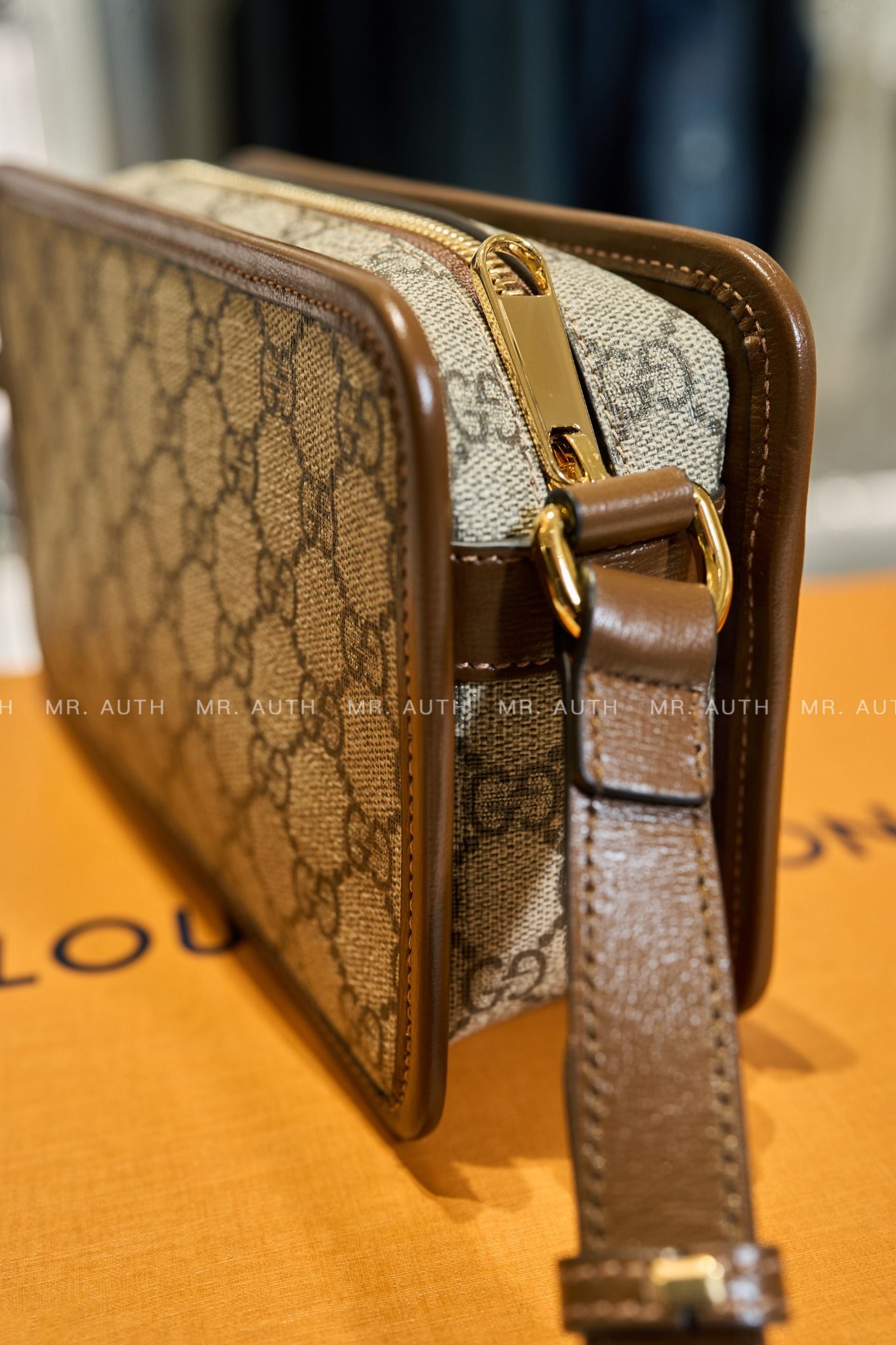 Gucci Mini Interlocking G Messenger Bag.