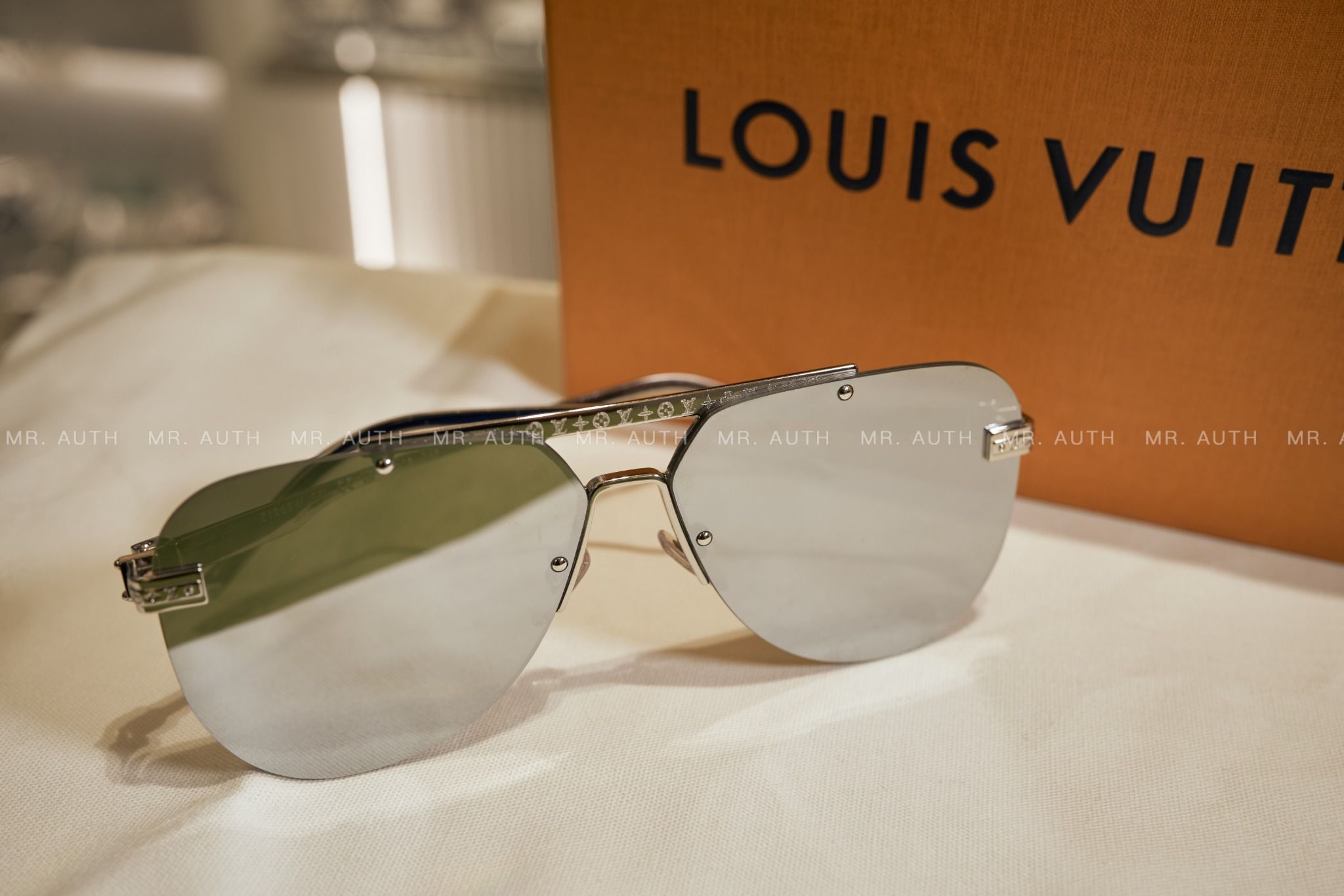 Louis Vuitton Sunglasses.