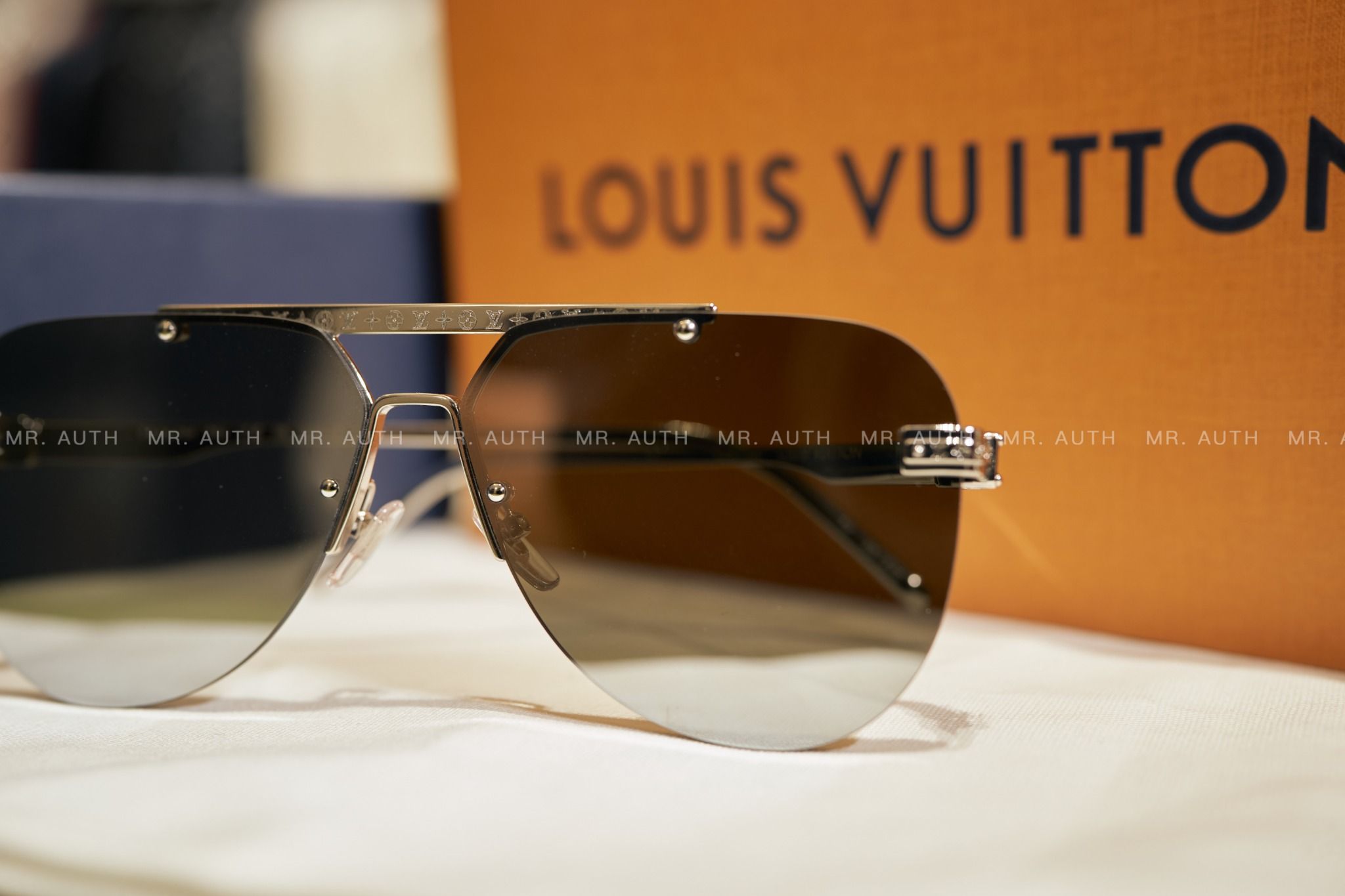 Louis Vuitton Sunglasses.