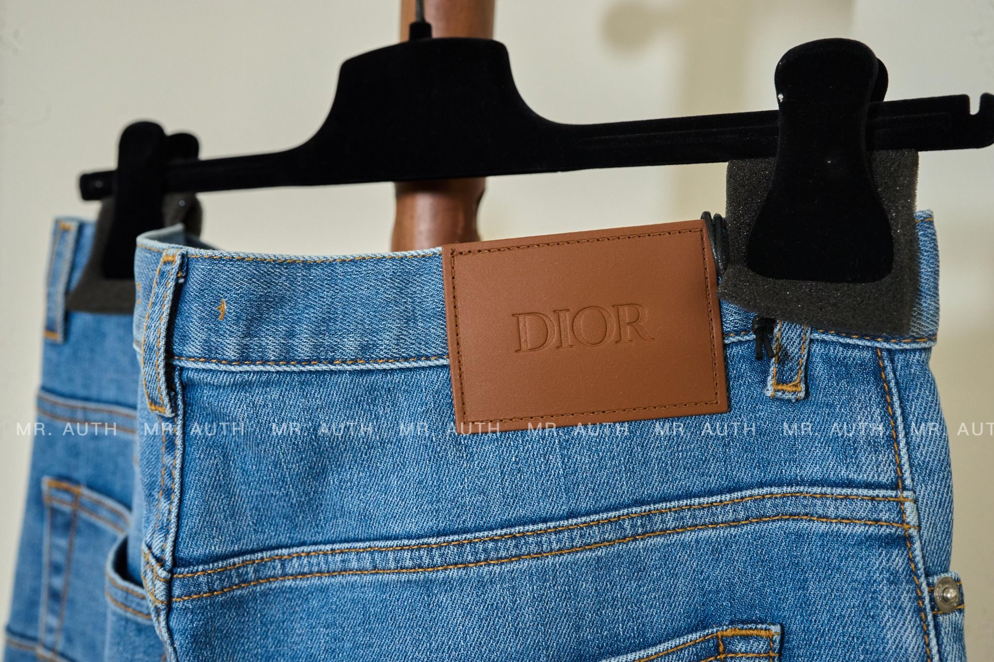 Dior Long Slim-Fit Jeans.