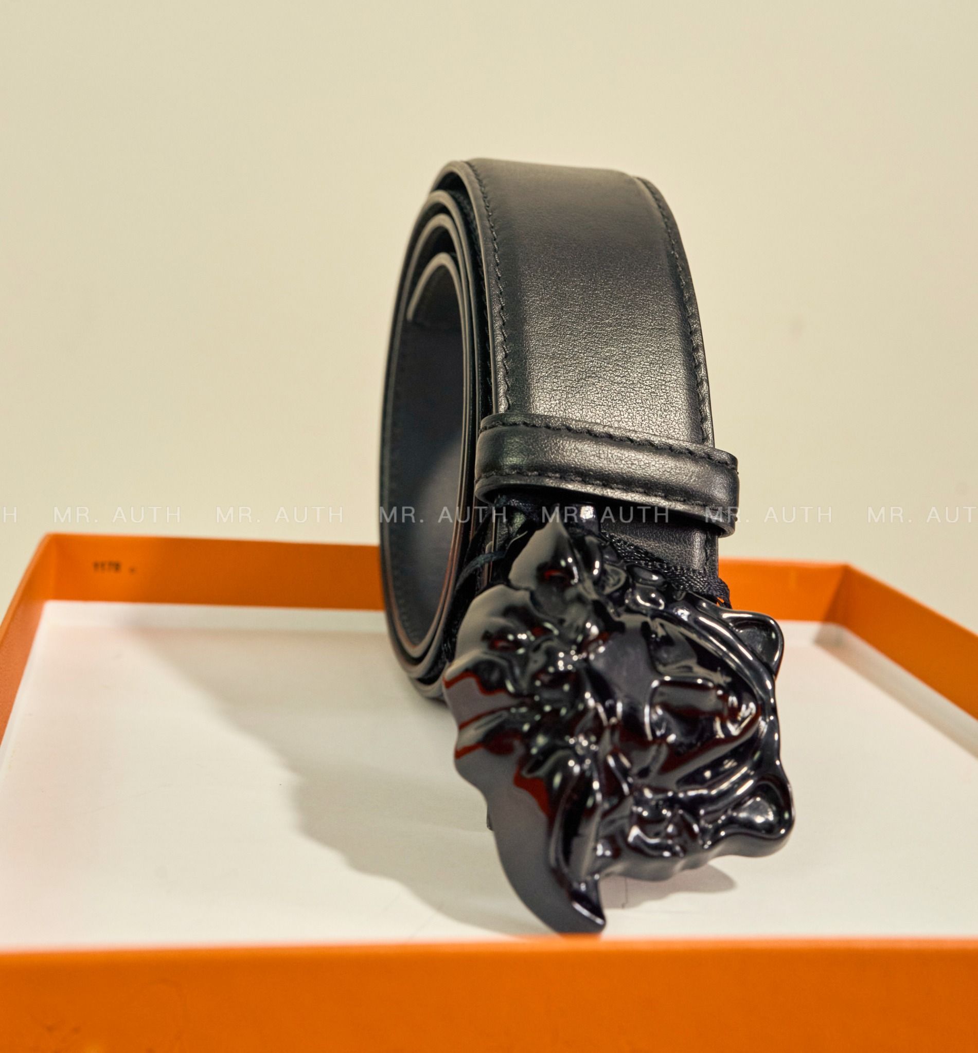 Versace Medusa Embossed Greca Leather Belt.