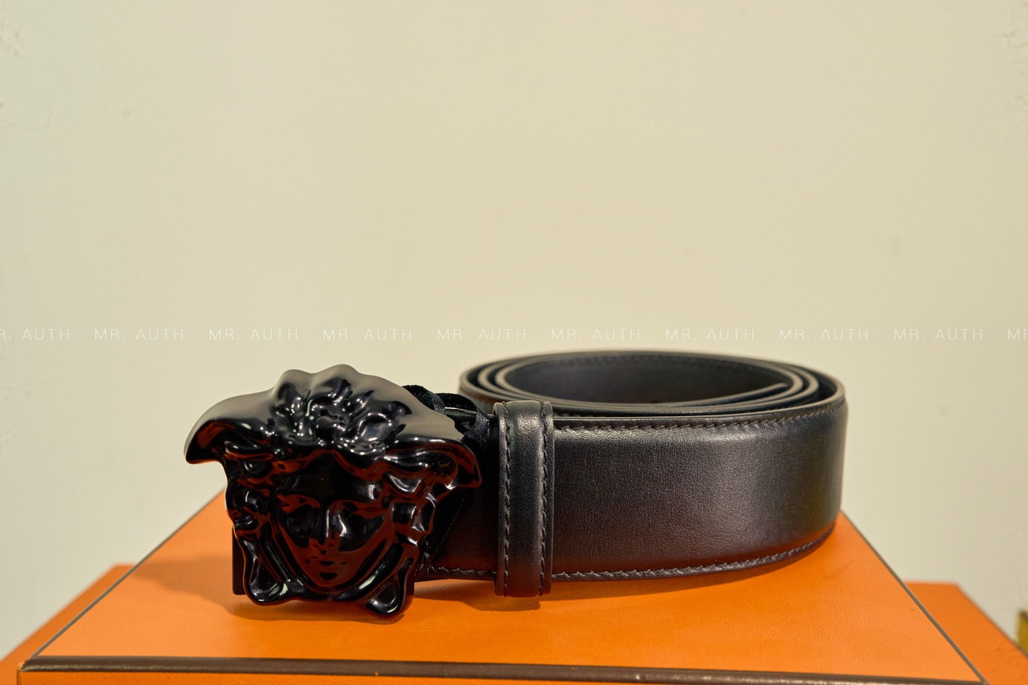 Versace Medusa Embossed Greca Leather Belt.
