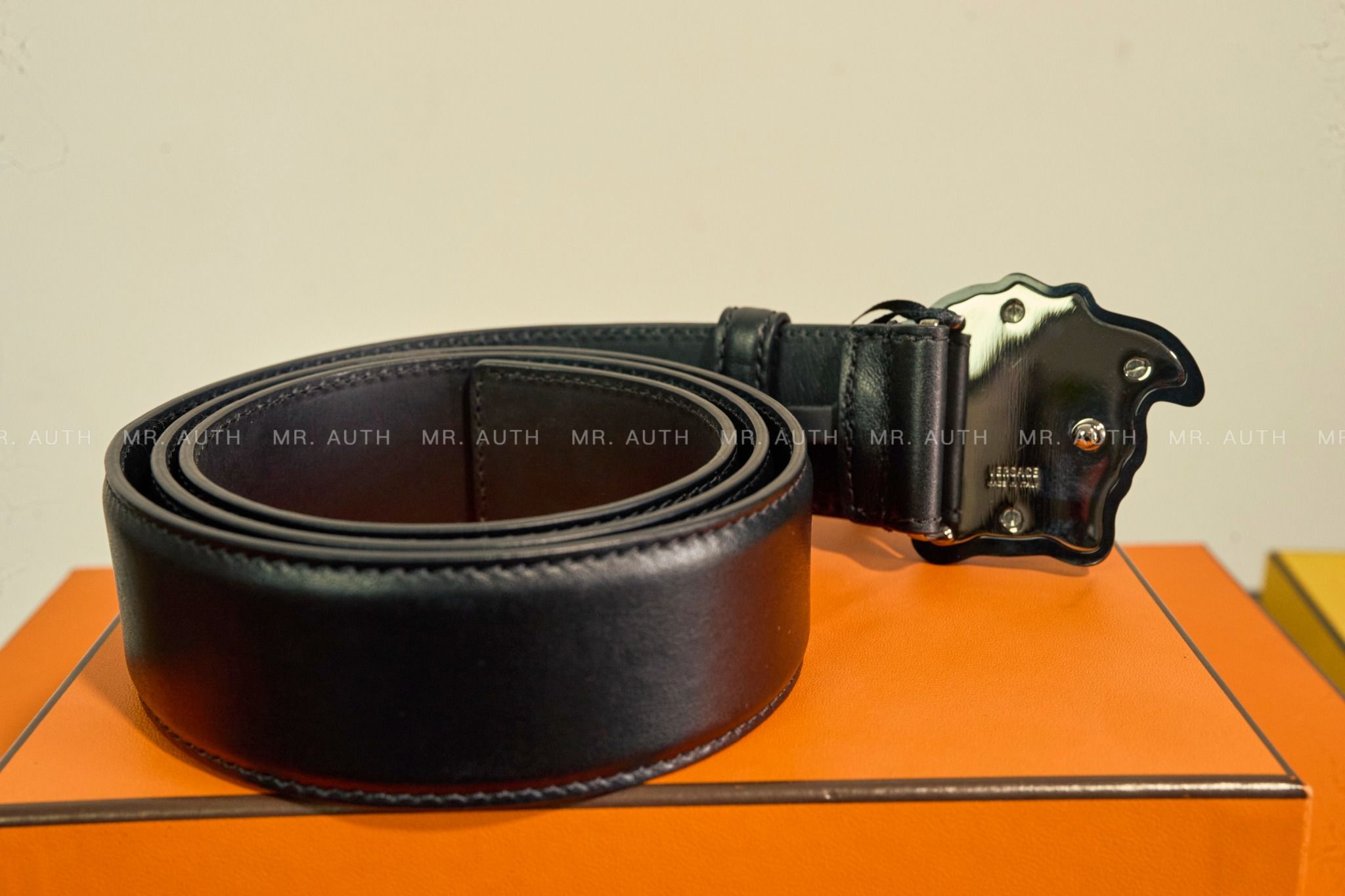 Versace Medusa Embossed Greca Leather Belt.