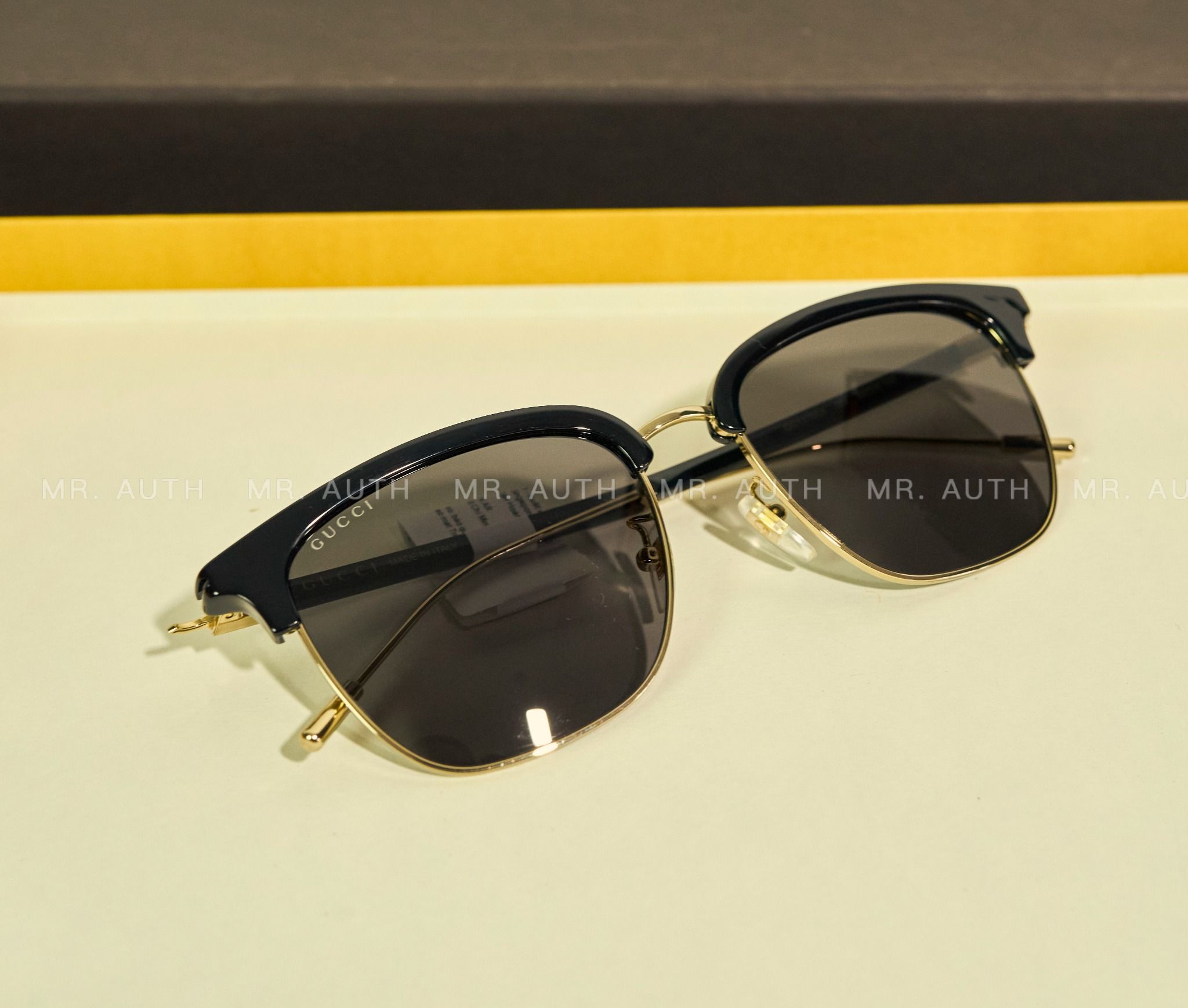 Gucci Sunglasses.