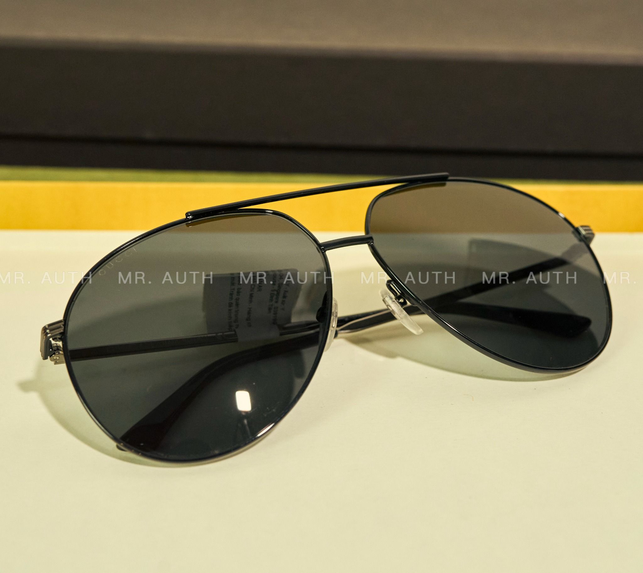Gucci Sunglasses.