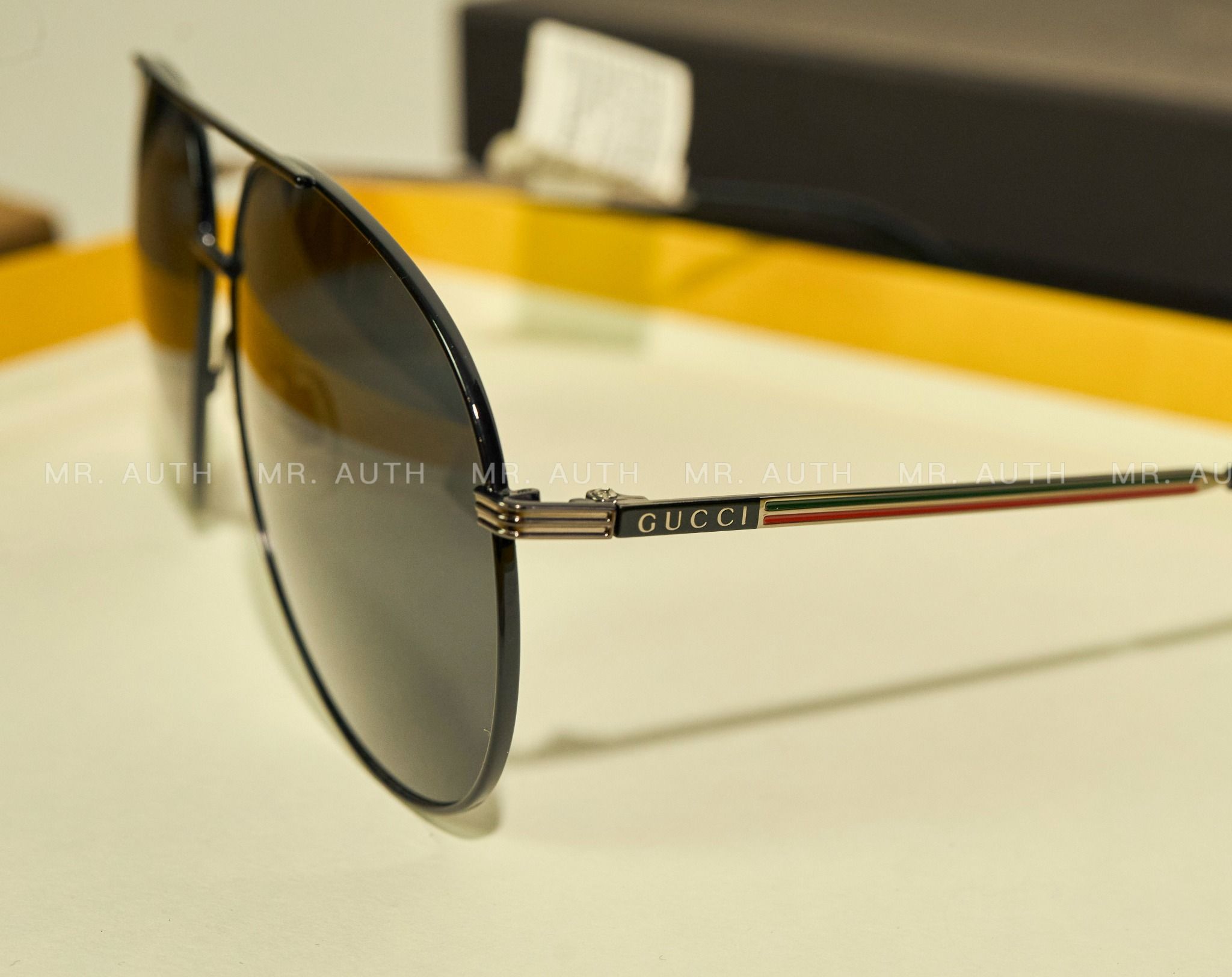 Gucci Sunglasses.