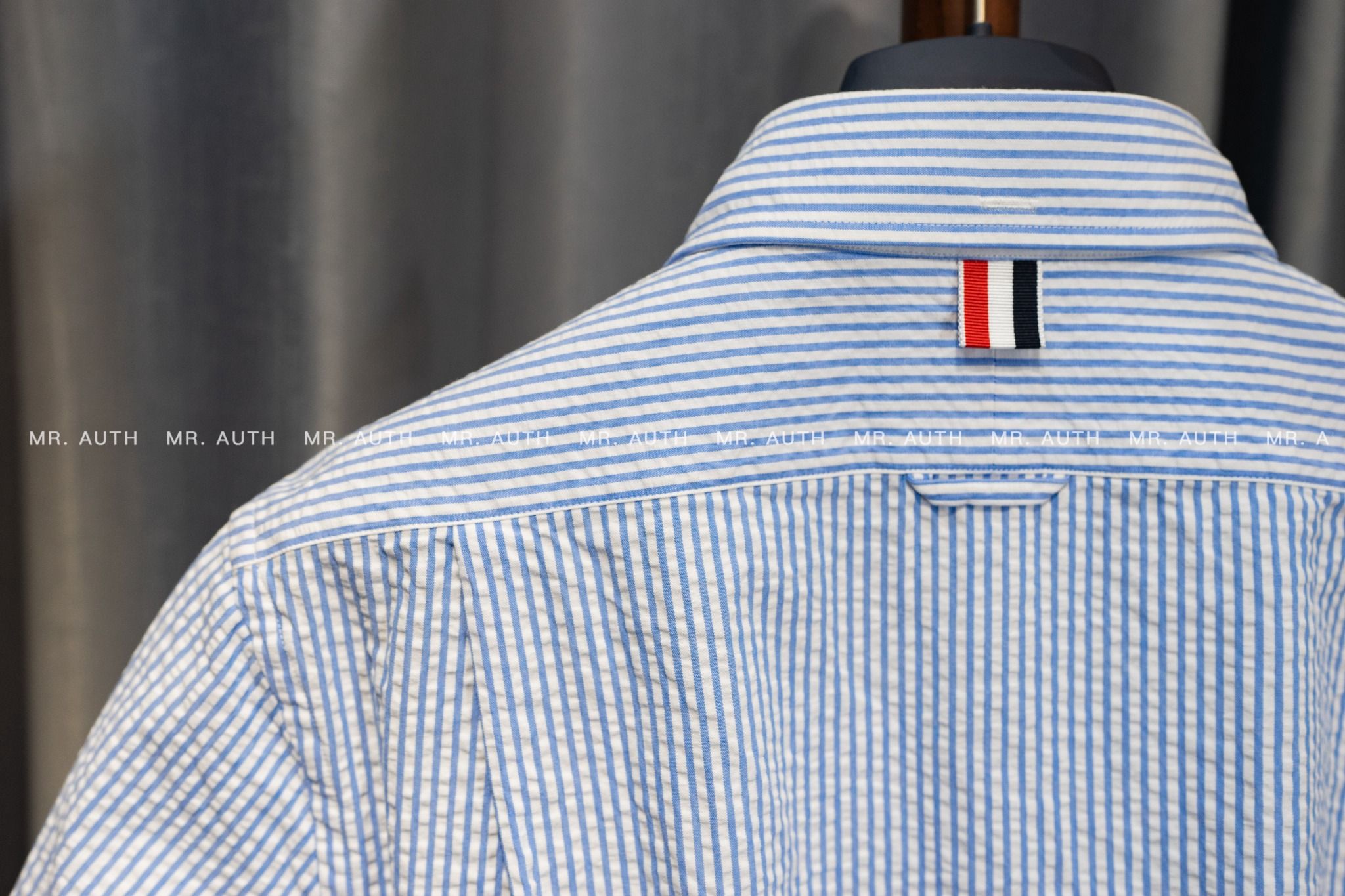 Thom Browne Light Blue Cotton Seersucker Grosgrain Cuff Straight Fit Short Sleeve Shirt.