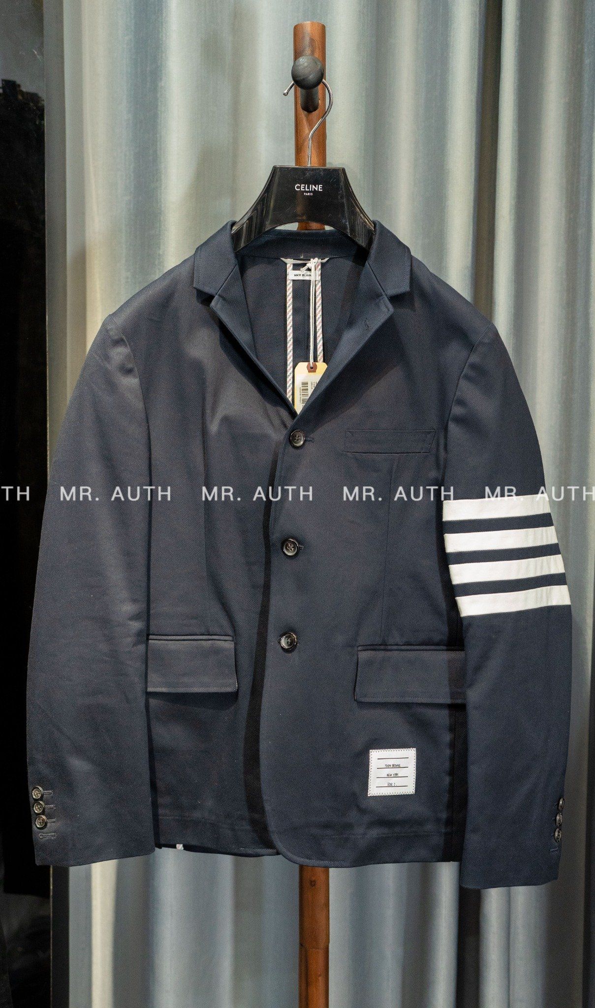 Thom Browne unconstructed 4-Bar single-breasted blazer.