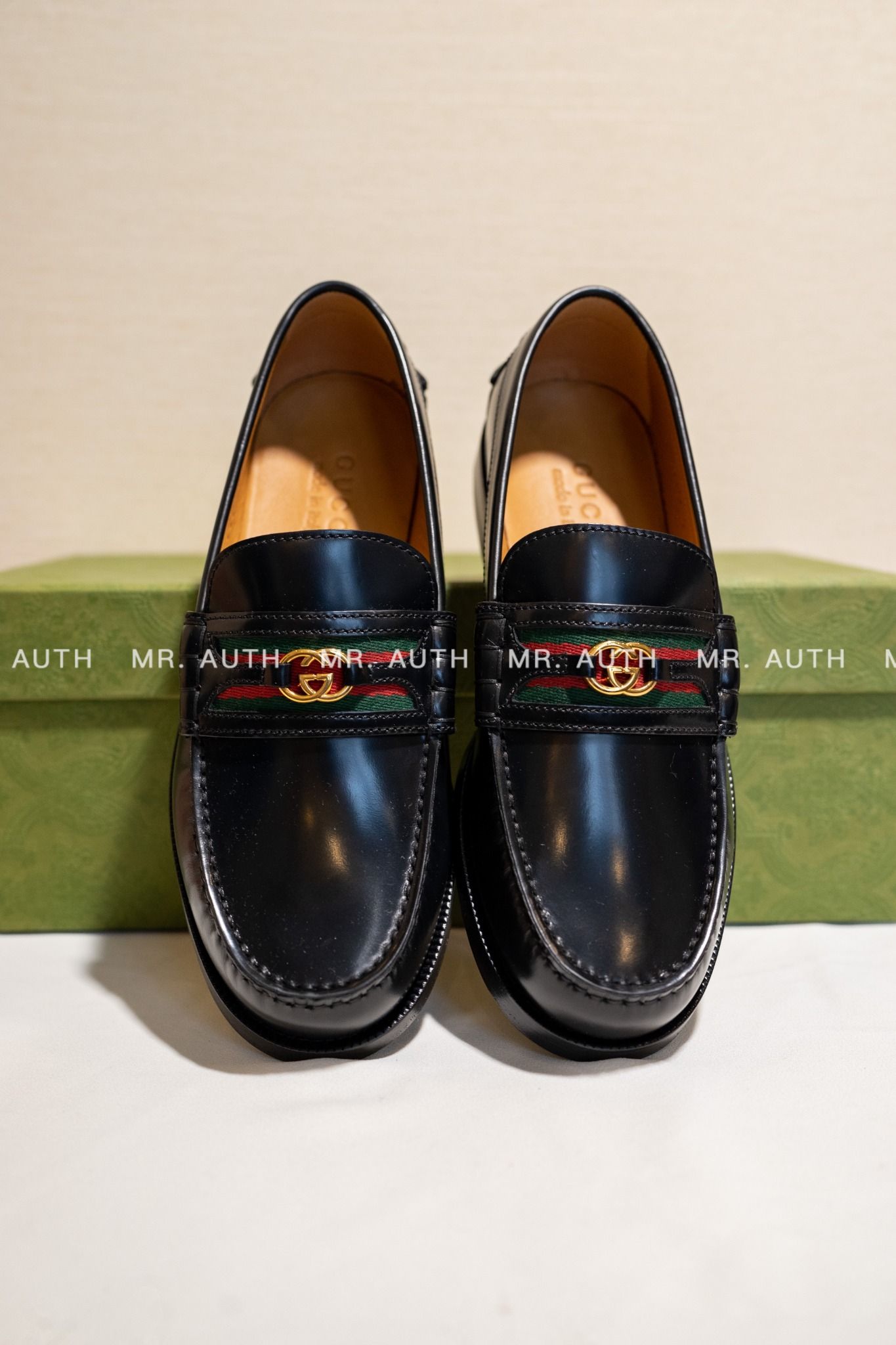 Gucci Kaveh Webbing-Trimmed Leather Loafers.