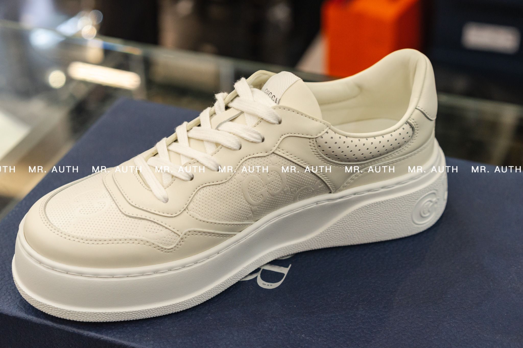 Gucci GG Embossed Trainer.