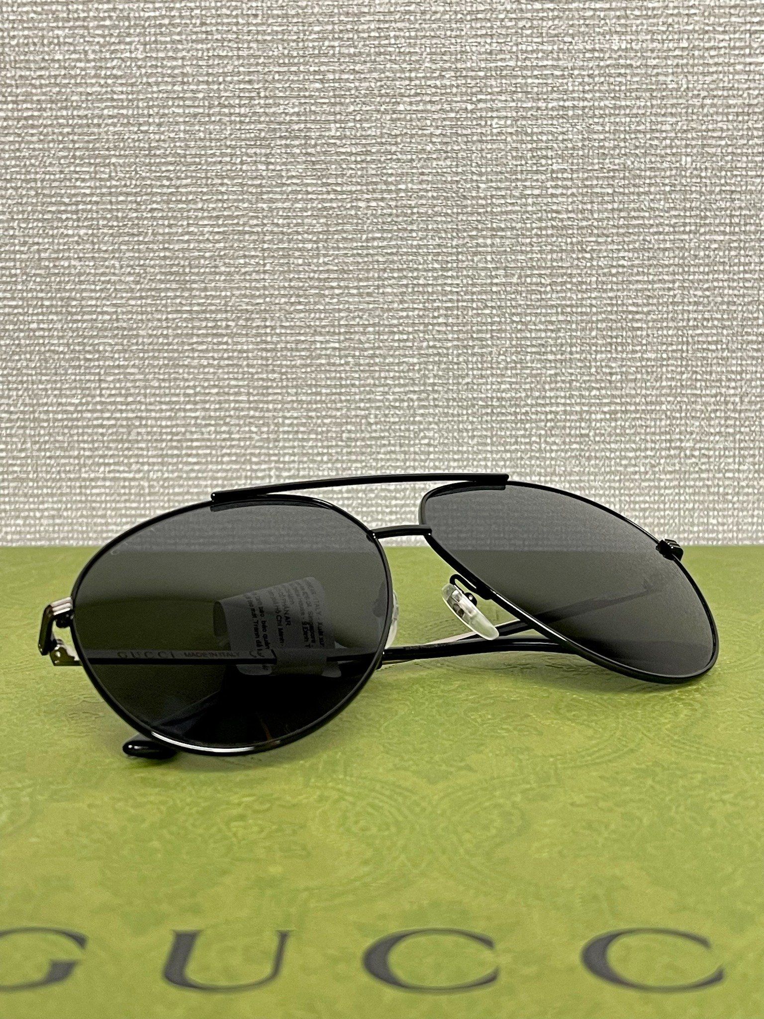 Gucci Sunglasses.