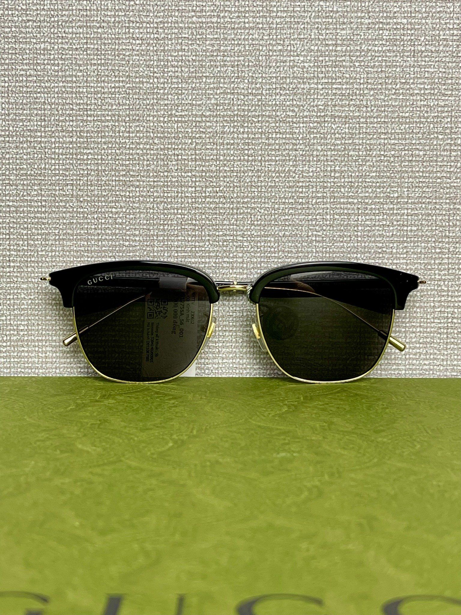 Gucci Sunglasses.