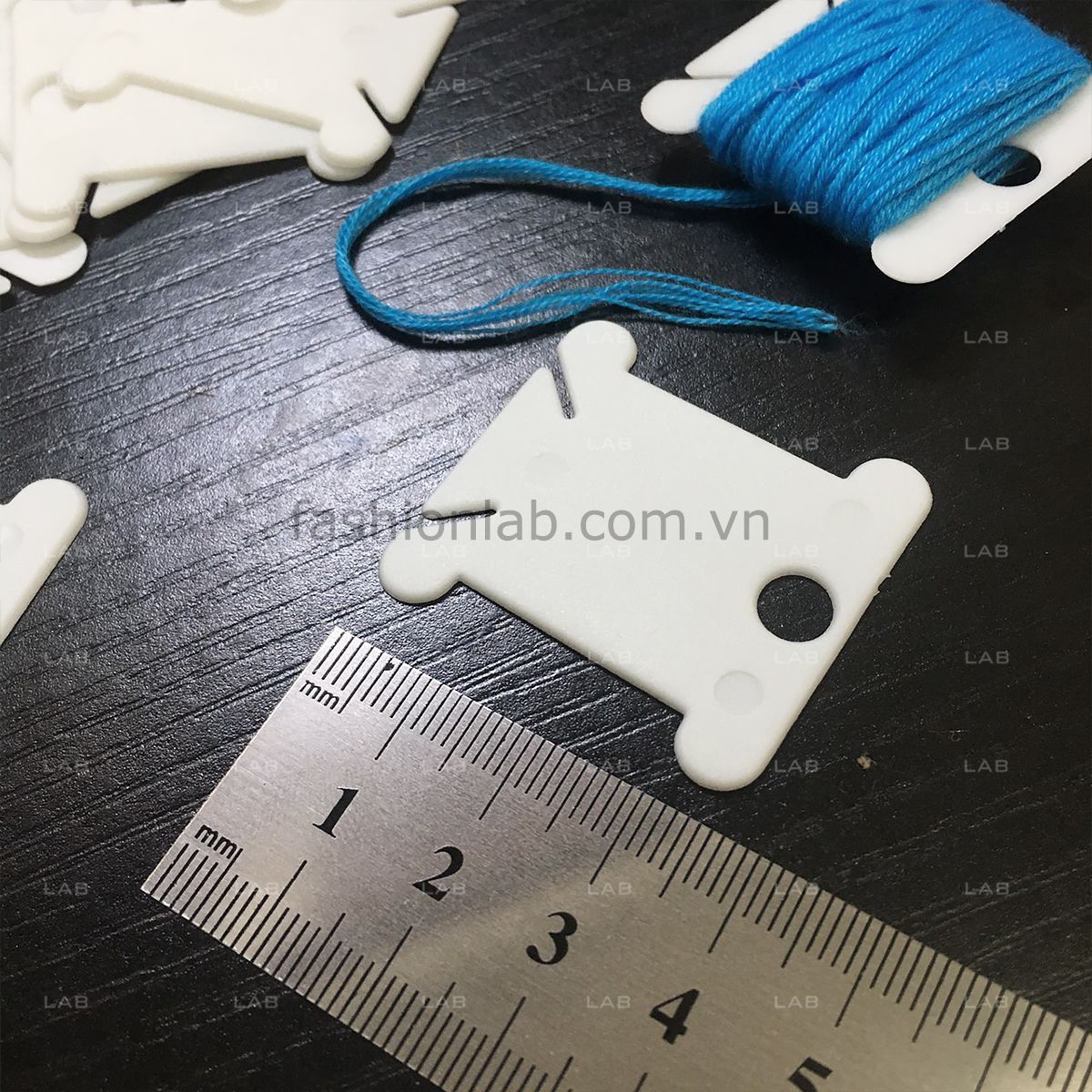 Thẻ cuộn chỉ #010105
