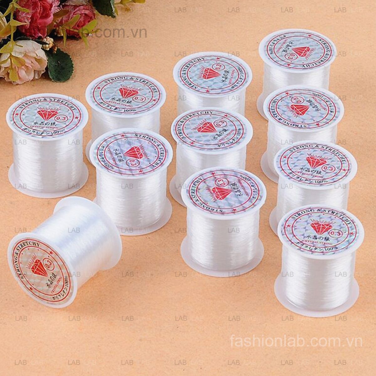 Dây cước xỏ chuỗi vòng cườm hạt đính kết