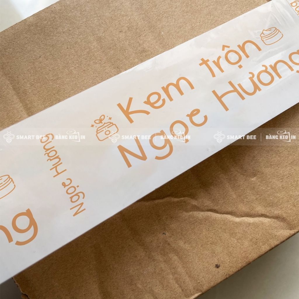 Băng keo màu CAM ĐÀO in chữ, in logo, in tên thương hiệu (in theo yêu cầu) BKMI