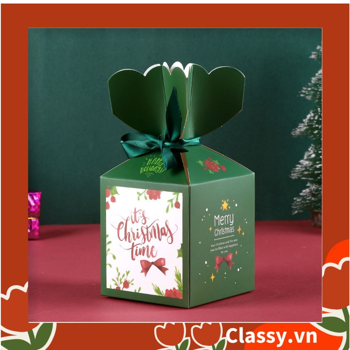 Hộp giấy Giáng sinh 9.5*8*8cm tự gấp hình viên kẹo, gắn ruy băng; in họa tiết NOEL vui vẻ Q765