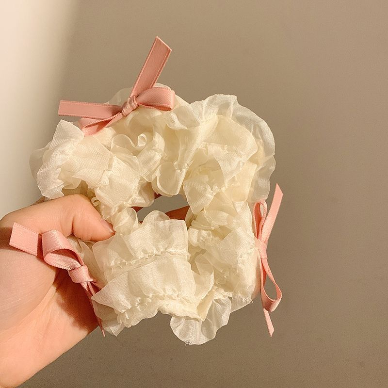 Kẹp tóc cột tóc scrunchies nơ màu hồng phấn mang lại nét nữ tính cho bạn nữ PK1152