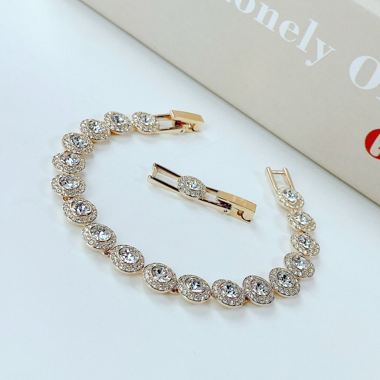 Lắc tay Swarovski Angelic màu vàng - Swarovski Angelic bracelet Round cut, Pavé, Medium, White, Gold-tone plated