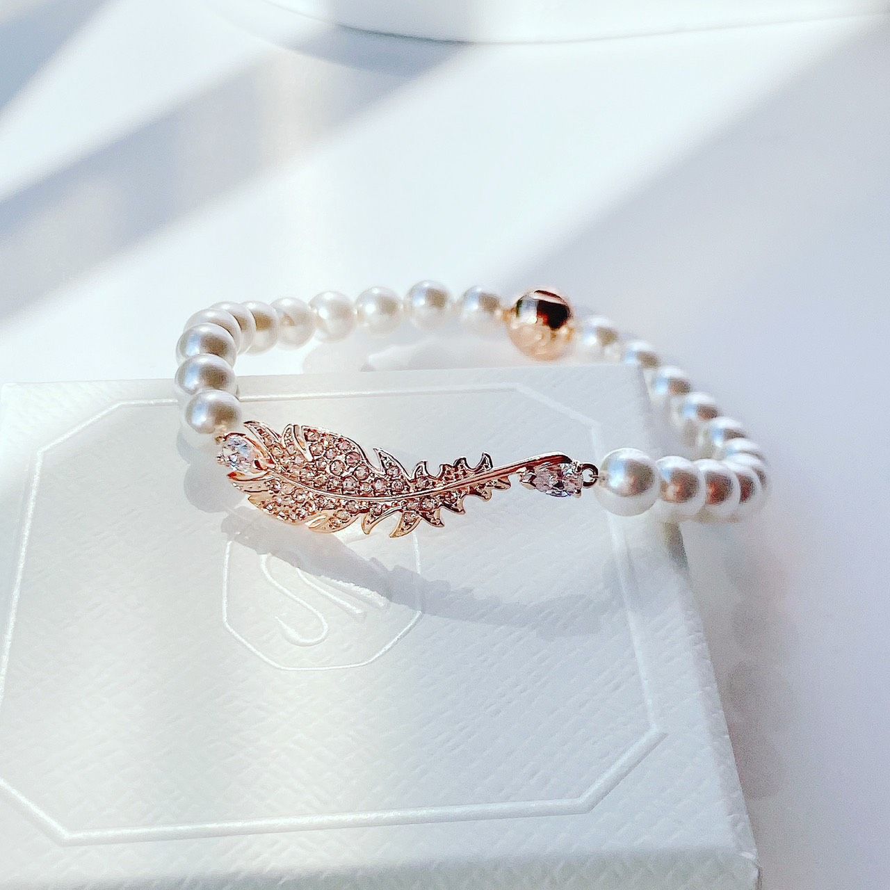 Nice bracelet Feather, White, Rose gold-tone plated, Size S