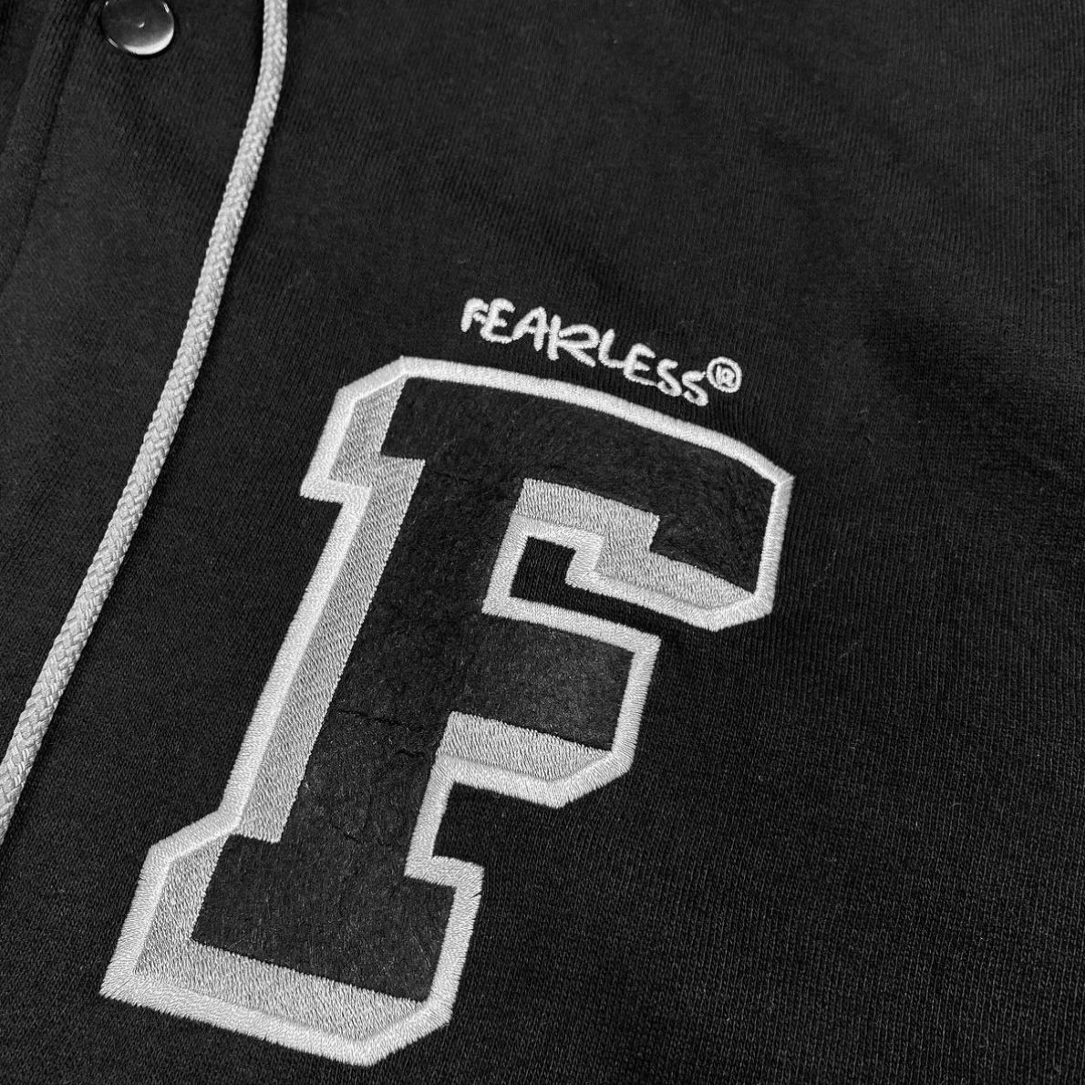 FEARLESS hooded varsity jacket