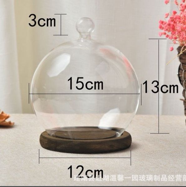 Lồng chụp hình cầu kèm đế gỗ, dùng để trang trí trong quầy bar, chất liệu: thủy tinh, ko phải pha lê chì, kích thước: 15*13*12cm