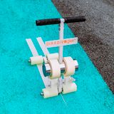 Dụng cụ định tuyến vạch sân tennis