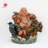 Tượng Di Lặc cưỡi Cá Chép hóa Rồng men hổ phách cao 66cm
