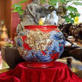 Lọ hoa sen dáng tròn men sứ đỏ kích thước cao 25cm đắp nổi vẽ vàng