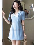 Đầm xanh cổ trắng đính nơ