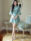 Đầm xanh mint tay chuông