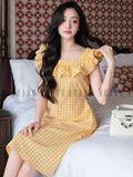 Đầm caro vàng phối cổ nhún