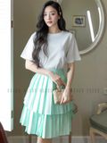 Chân váy xanh xếp ly tầng