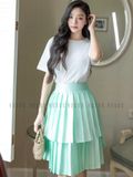 Chân váy xanh xếp ly tầng