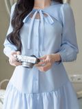 Đầm xanh tay dài phối nơ