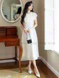Đầm kem cổ xếp tầng