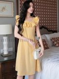 Đầm caro vàng phối cổ nhún