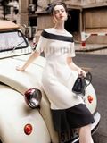 Đầm trắng cổ tròn phối đen