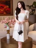 Đầm trắng xếp ly