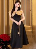 Đầm đen tay nơ
