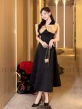 Đầm đen tay nơ