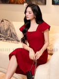 Đầm gấm đỏ tay con