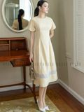 Đầm kem dài cổ tròn