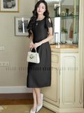Đầm đen cổ giọt nước