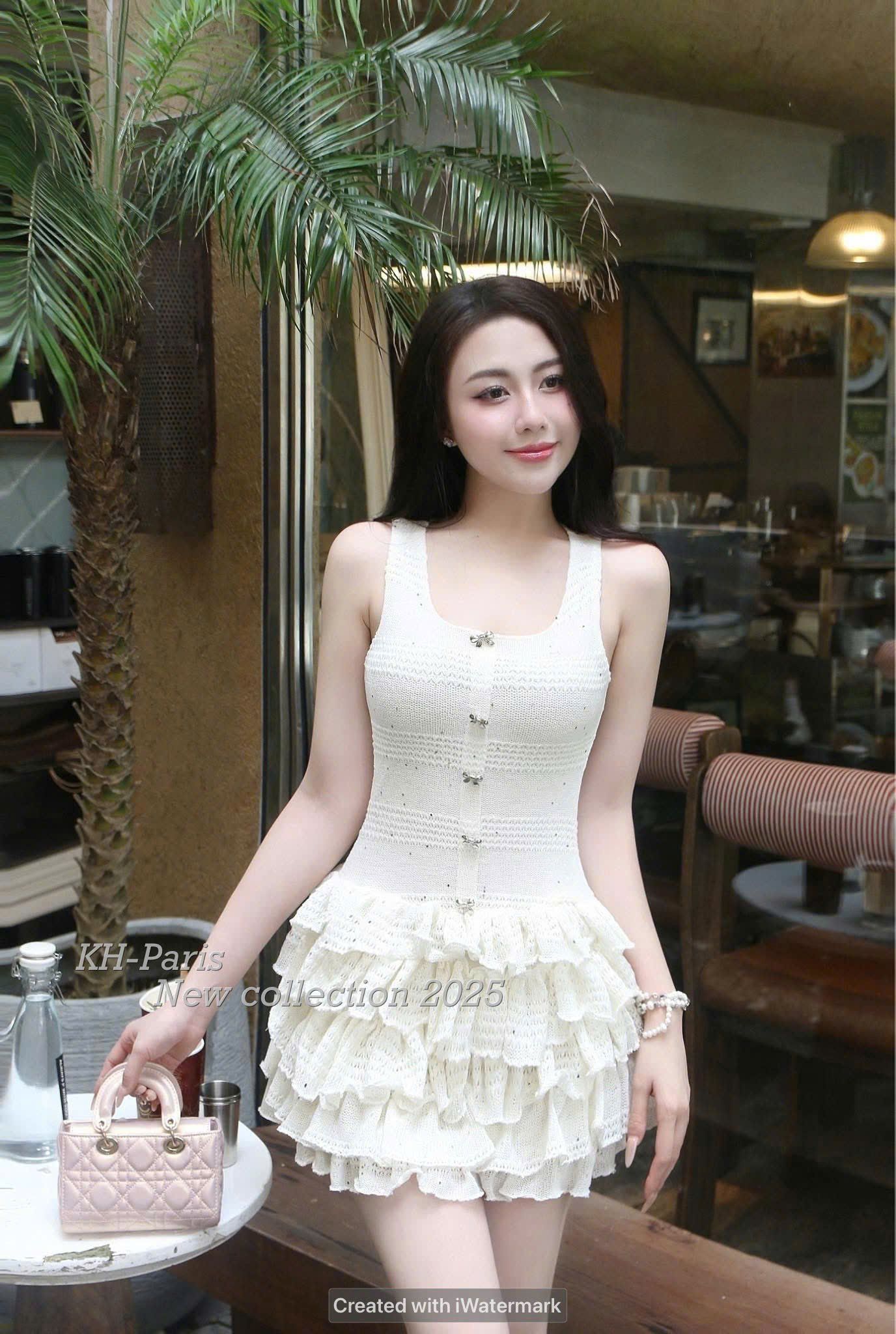 Váy len sát nách khuy nơ tầng lấp lánh dáng ngắn - M367