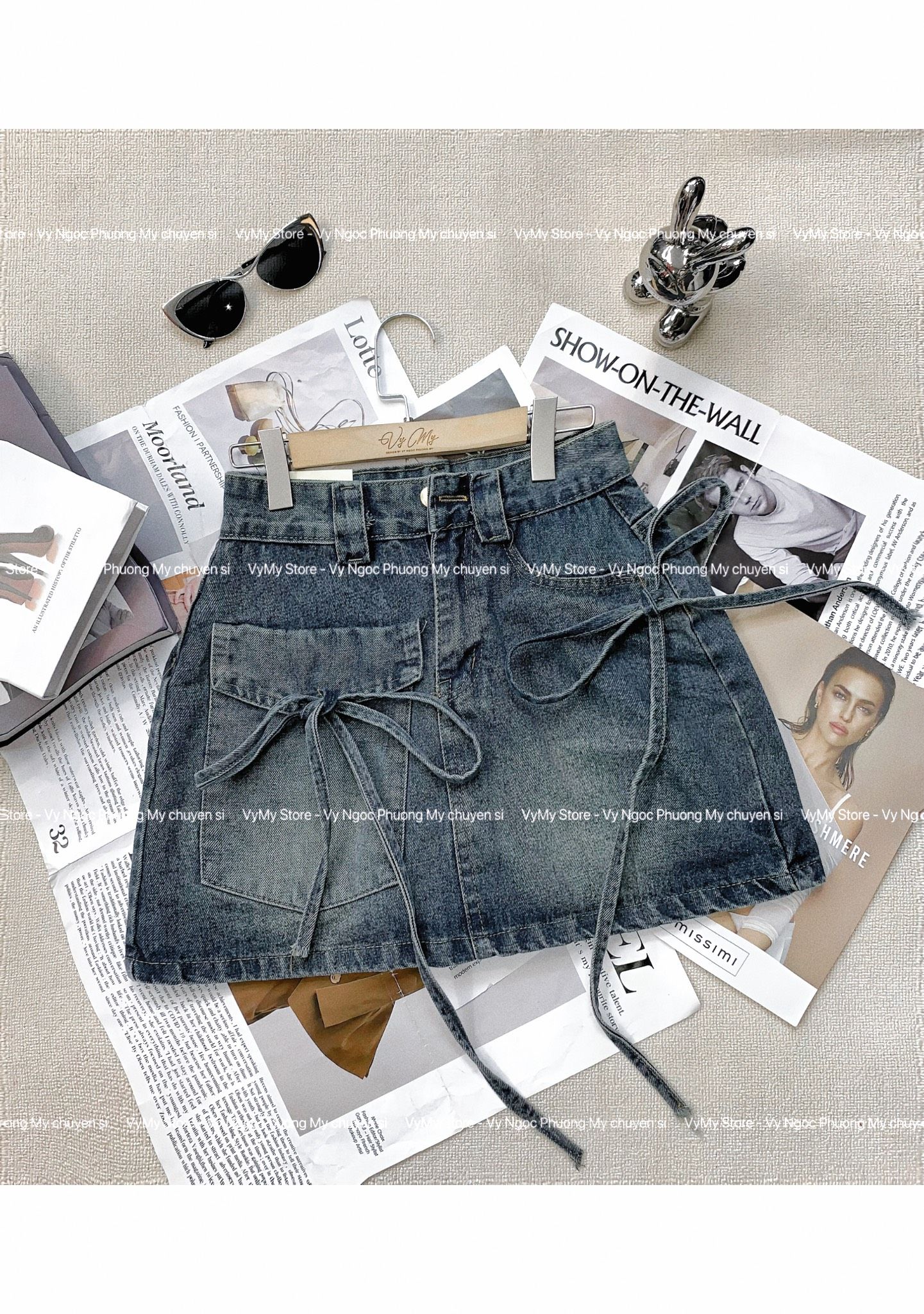 Chân váy Jeans ngắn dáng chữ A thiết kế nơ túi siêu xinh - H243 ( eo S<68, M< 70, L< 74)