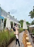 Áo khoác phao gile cổ lông có dây rút eo - NÂU - U471