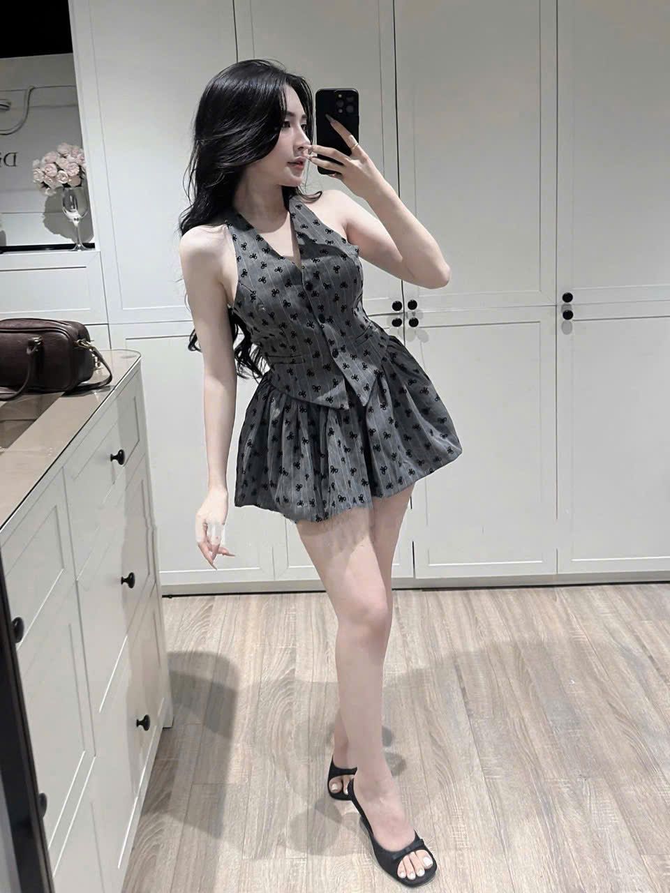 Set áo gile mix chân váy xòe lưng chun họa tiết nơ - Z355