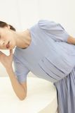 Đầm tay ngắn gài nút sau tùng dưới xếp li xanh da trời