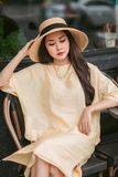 Set chân váy - áo tay liền vạt lệch vàng nhạt