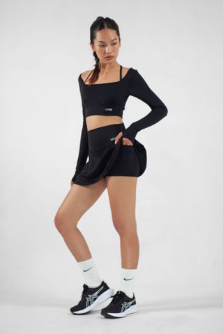 UniqFit Set Tập Thể Thao Cool Peel Tennis Skirt Đen